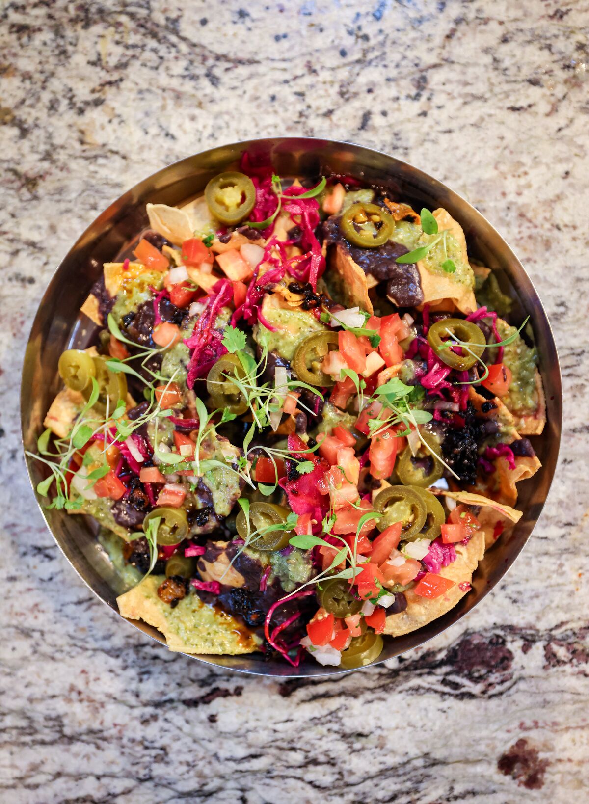 Nachos, loaded, from above — see this on our Instagram